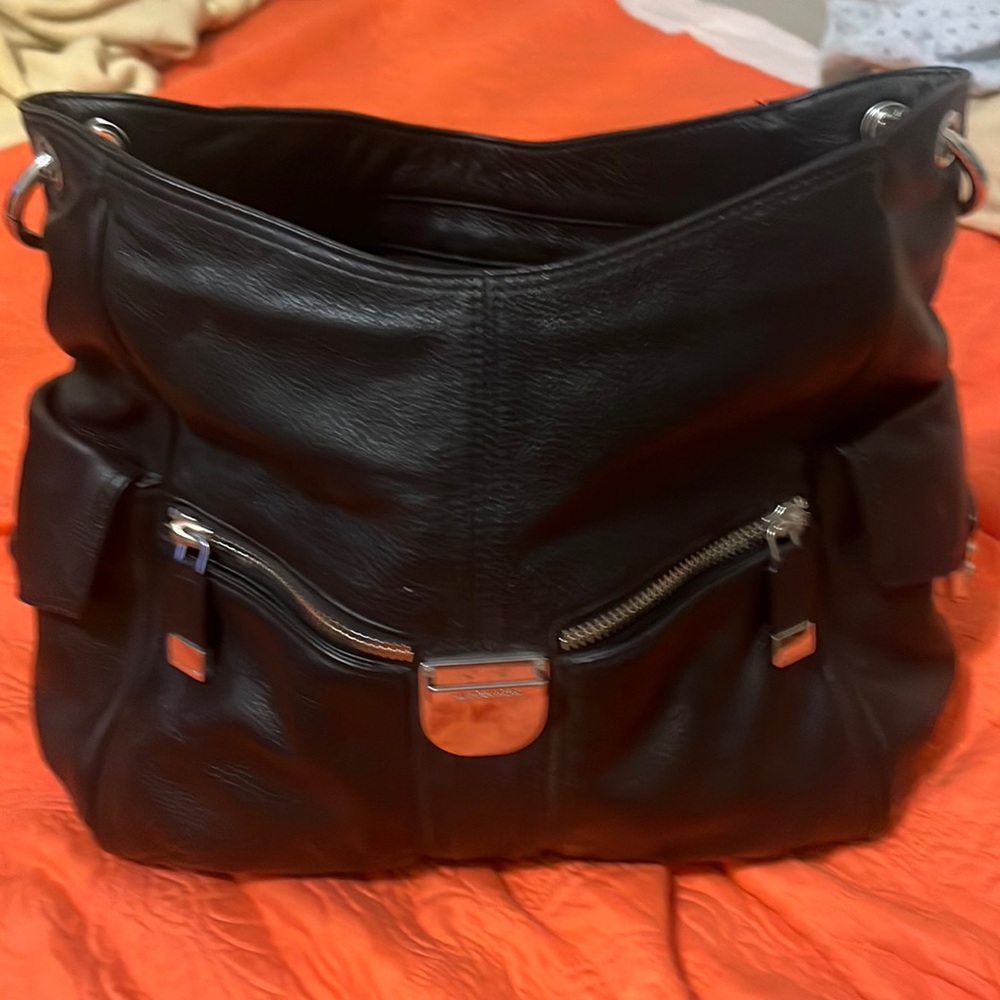 Brand new black leather authentic Michael Kors purse never been used